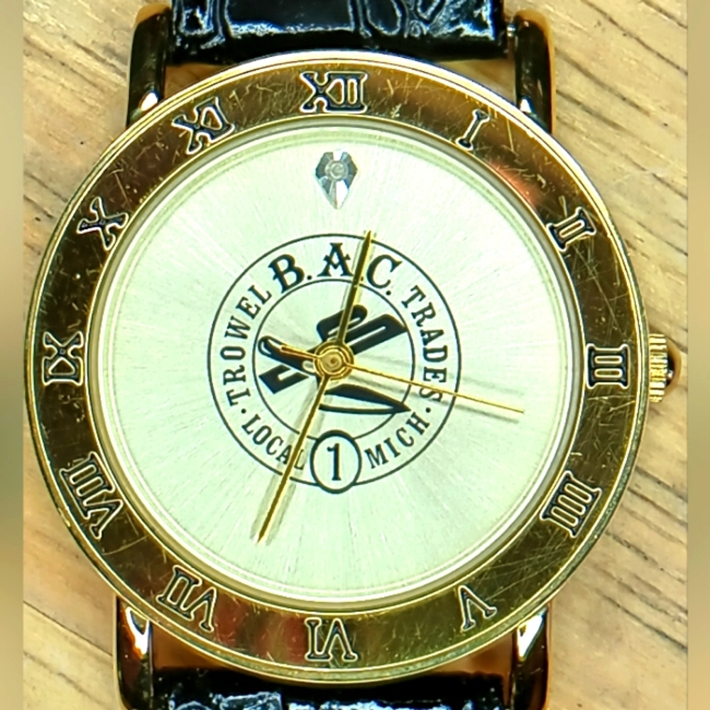 Award watch for Local 1 B.A.C. Gold tone case and dial black Leather Watchband